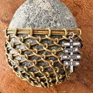 Decorative Stone with hand wrapped leather Net and Charm